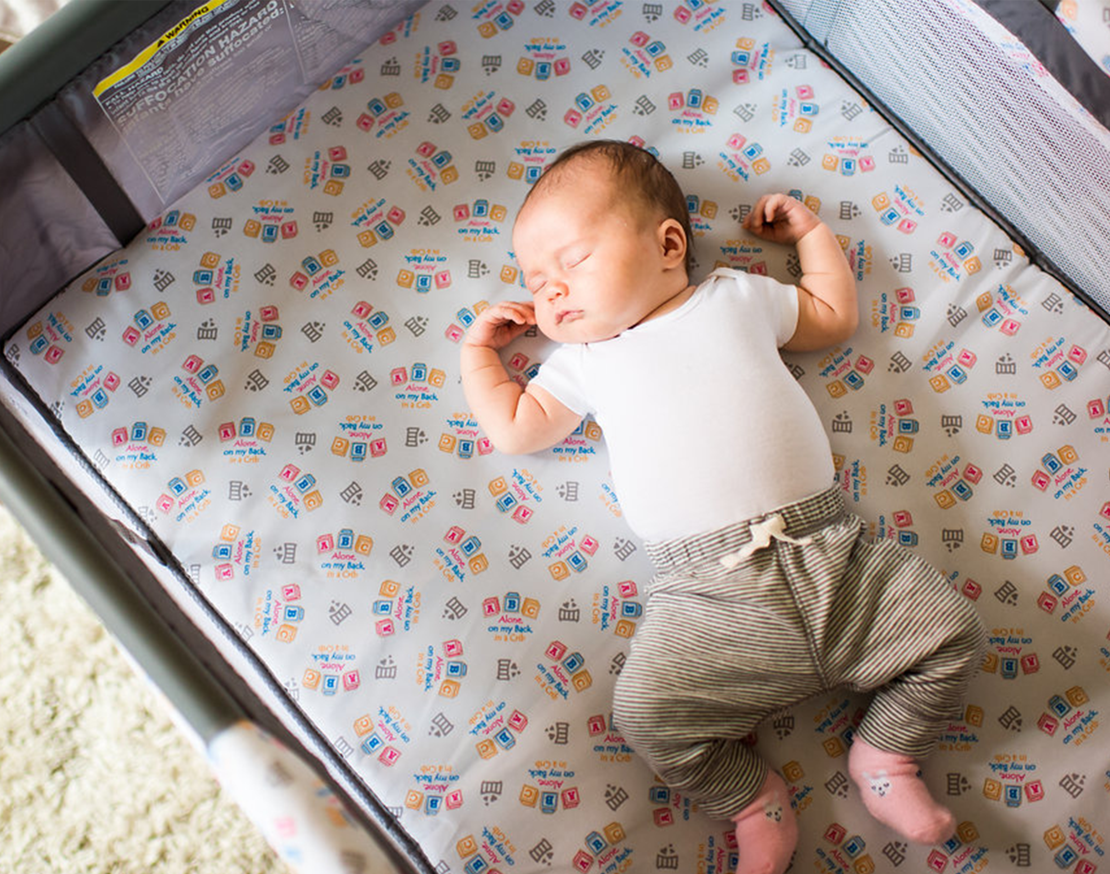 Baby Laying a crib