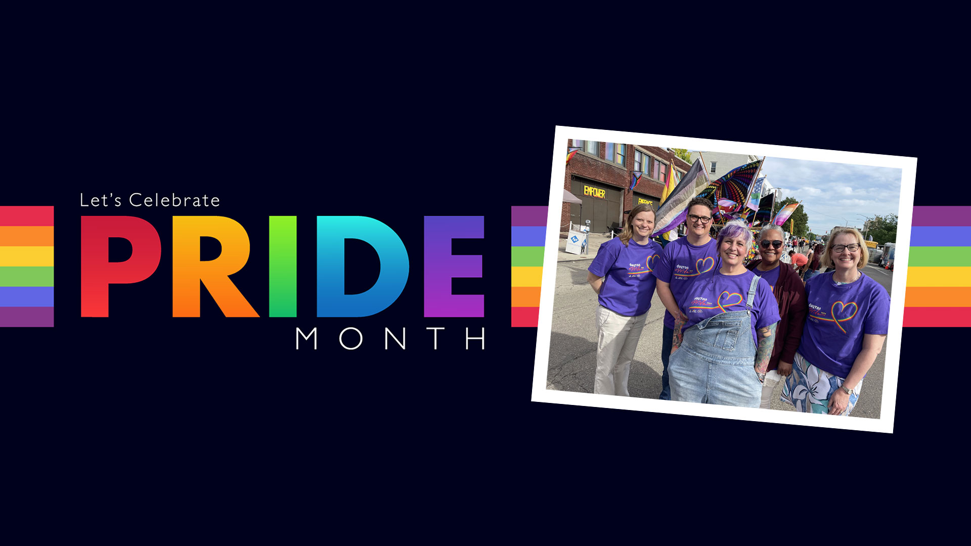 Pride Month celebration graphic with rainbow-colored text and stripes. A group photo shows smiling individuals in purple shirts at a vibrant street event.